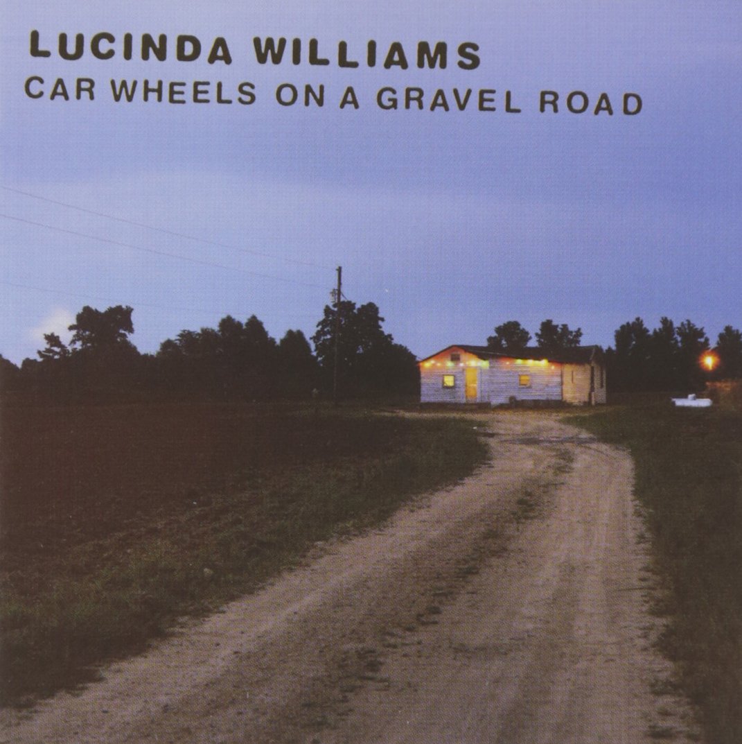 Car Wheels On A Gravel Road - 6703